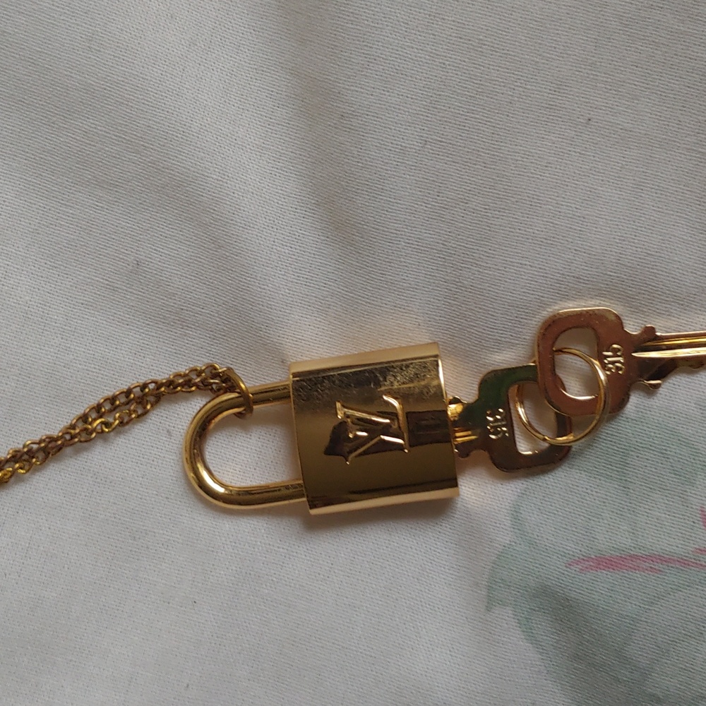 Louis Vuitton key and lock with chain